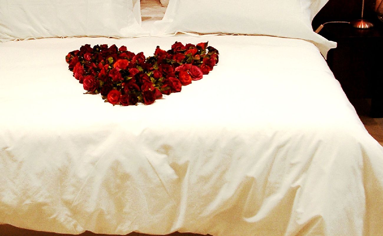 Rose Heart On Bed